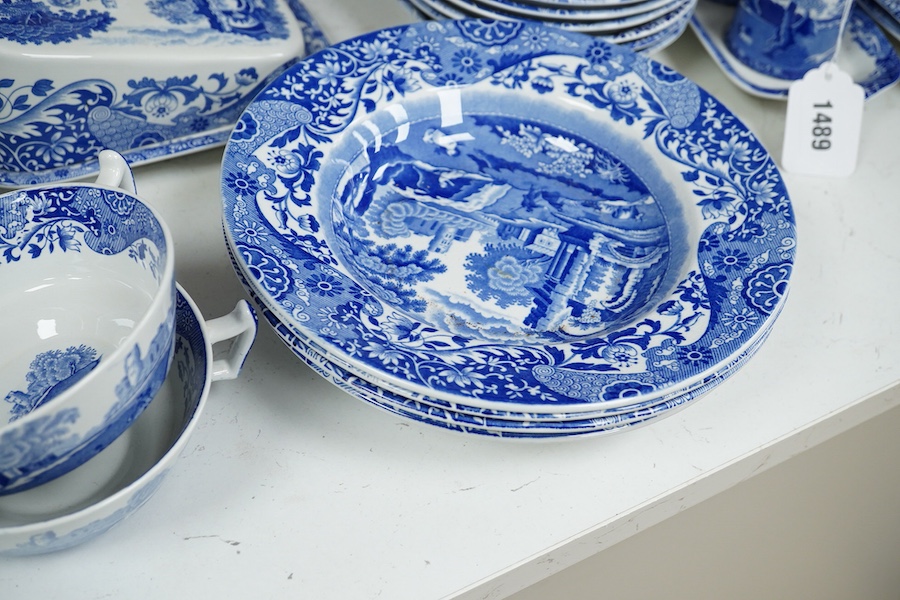 A quantity of Spode Italian dinner ware to include tureens, twin handled soup dishes and platters and a circular bread plate, largest 35cm wide